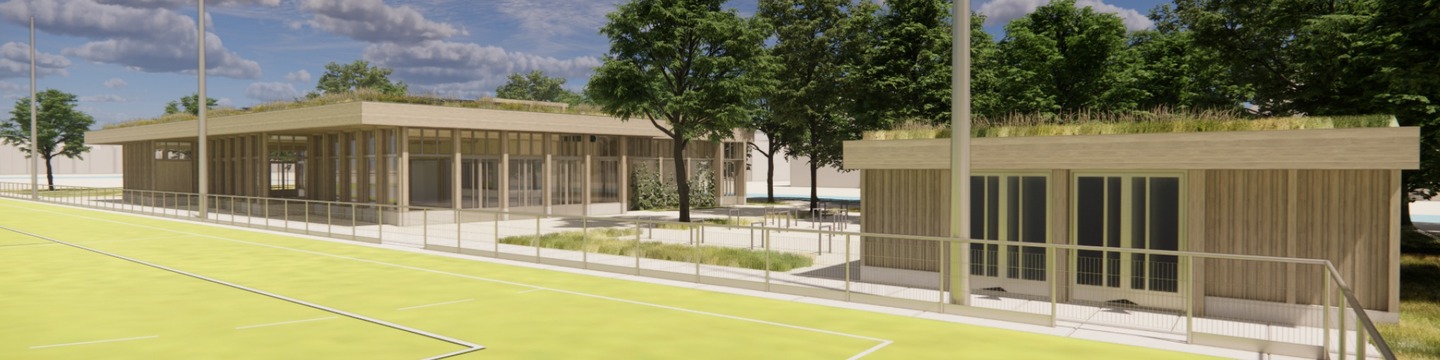 Overzichtsfoto nieuw clubgebouw, berging en deel van het sportveld.
